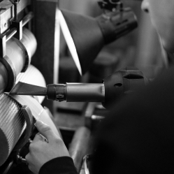 A man working operating a machine