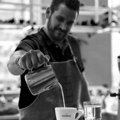 A person making coffee