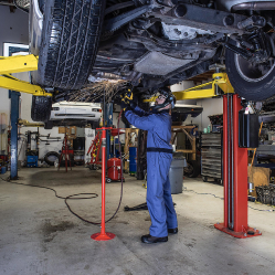 Person working on a car