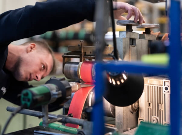 a man printing a belt